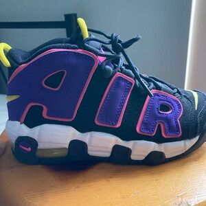 Pink, black, yellow, white. Brand new, never worn